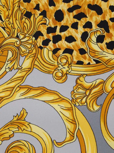 VERSACE YELLOW SCARF WITH GEOMETRIC ALL-OVER MOTIF IN SILK WOMAN