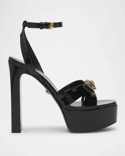 VERSACE GIANNI PATENT BOW PLATFORM SANDALS