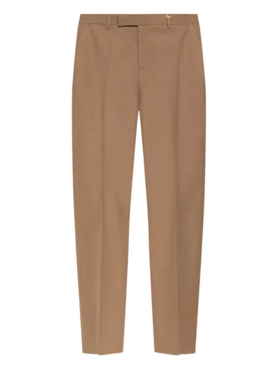 Versace Gold-button Wool Trousers In Brown