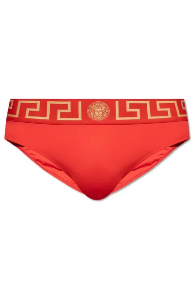 Versace Greca Border Stretched Swim Shorts In Red