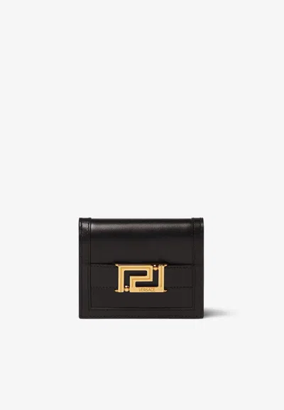 Versace Greca Goddess Bi-fold Wallet In Calf Leather In Black