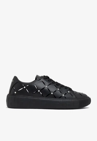 Versace Perforated Studded Sneakers In Black
