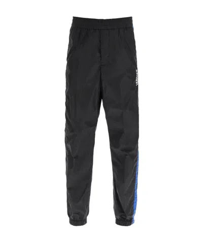 Versace Greca-trim Logo-embroidered Track Pants In Black