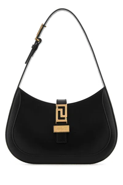 Versace Handbags. In 黑色的