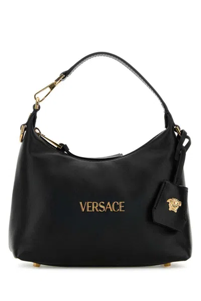 Versace Handbags. In Blackgold