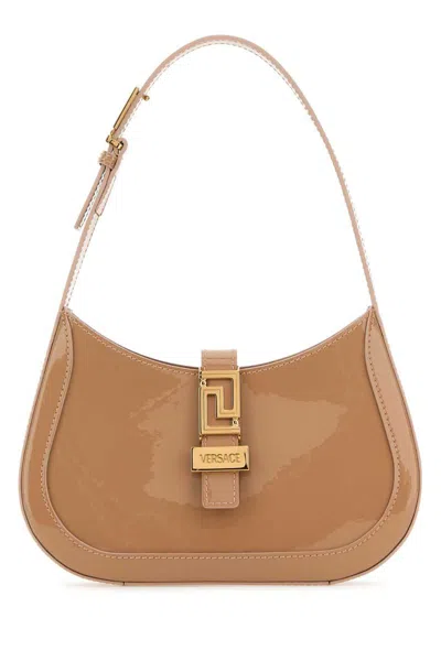 Versace Handbags. In Brown