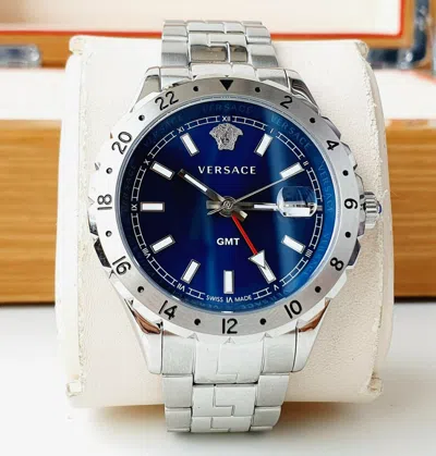 Pre-owned Versace Hellenyium Gmt V11010015 Sapphire Blue Dial Silver Tone Men's Watch