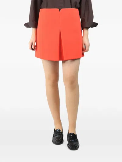 Pre-owned Versace Inverted-pleat Mini Skirt In Orange