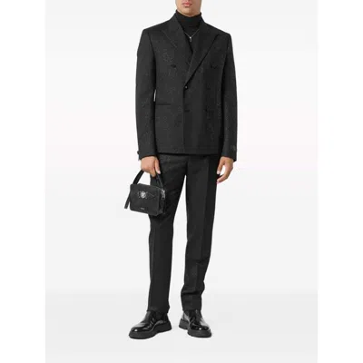 Versace Patterned-jacquard Tapered-leg Trousers In Black