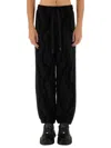 Versace Black Jogger Pants With Textured Pattern In Black