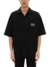 Shop Versace Jeans Couture Black Polo With Logo Patch Pocket