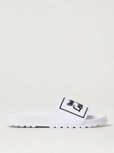 VERSACE JEANS COUTURE FLAT SANDALS VERSACE JEANS COUTURE WOMAN COLOR WHITE,G70863001