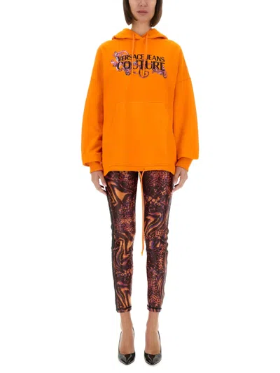 Versace Jeans Couture Hoodie With Logo And Crystals In Orange