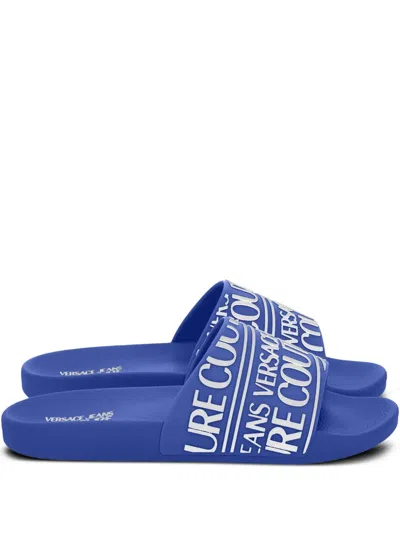 Versace Jeans Couture Logo-embossed Slides In Blau
