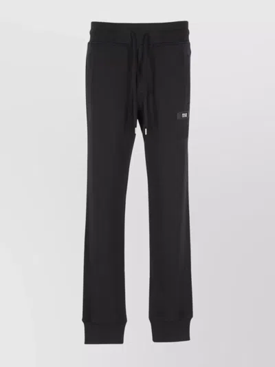 Versace Jeans Couture Trousers Featuring Drawstring Waist And Ribbed Cuffs In Black