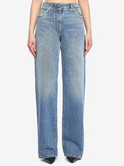 Versace Raw Cut Frayed Jeans In Blue