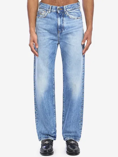 Versace Stonewash Jeans With Studs In Blue