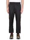 Versace Graphic-stripe Taffeta Track Pants In Black
