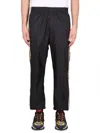 Versace Graphic-stripe Taffeta Track Pants In Black
