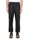 Versace Graphic-stripe Taffeta Track Pants In Black