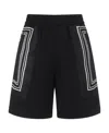 Versace La Greca Logo Printed Shorts In Black