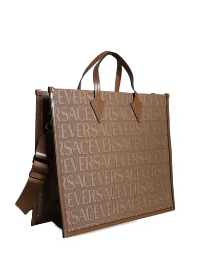 Versace La Greca Monogram Tote Bag In Brown
