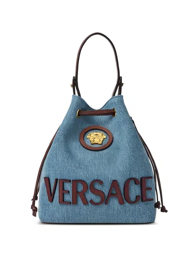 Versace La Medusa Logo-plaque Drawstring-fasteningtote Bag In Blue