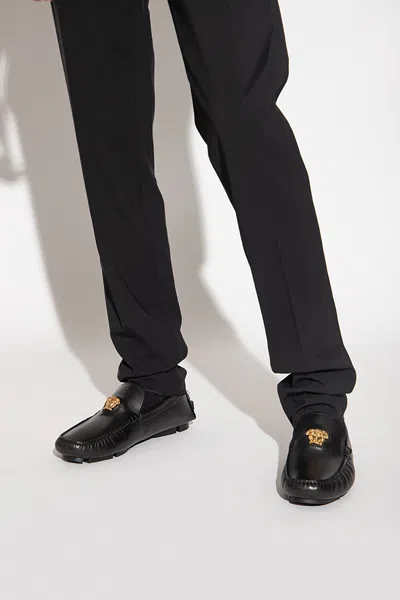 Versace Logo Plaque Leather Loafers In Black