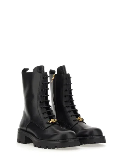 Versace Lace-up Leather Boots In Black