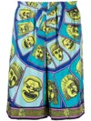 Versace Le Maschere Print Silk Shorts In Blue