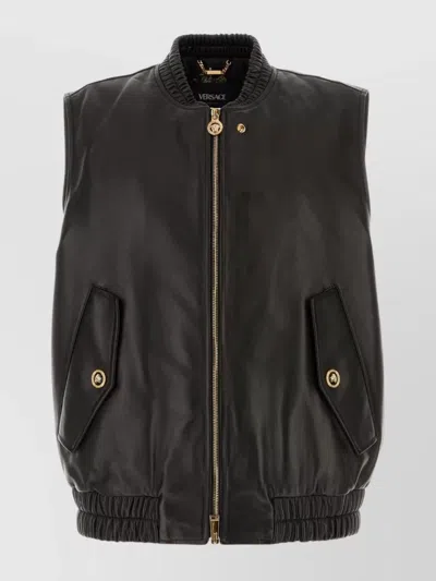 VERSACE LEATHER JACKET WITH ELASTICATED HEM AND FRONT POCKETS