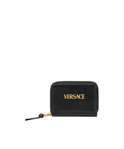 VERSACE VERSACE LOGO-LETTERING ZIPPED WALLET