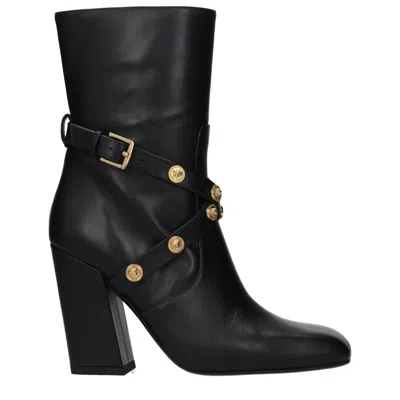 Versace Leather With Gold-button Strap Detail Ankle Boot In Black