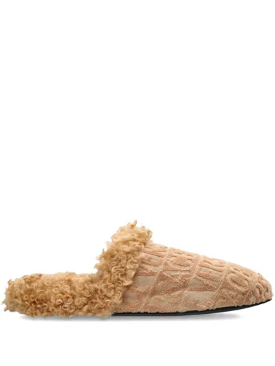 Versace Logo Curly Slippers In Nude