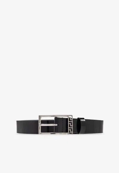 Versace Logo Engraved Leather Belt In Black