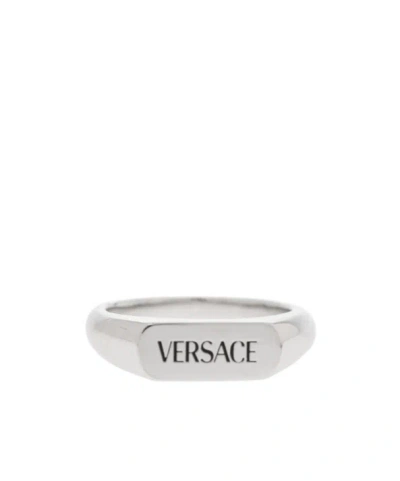 Versace Logo Engraved Ring In Metallic