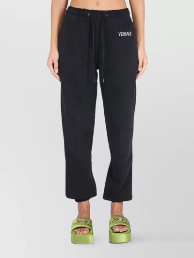 Versace Logo Jogging Pants Featuring Back Pocket In Black