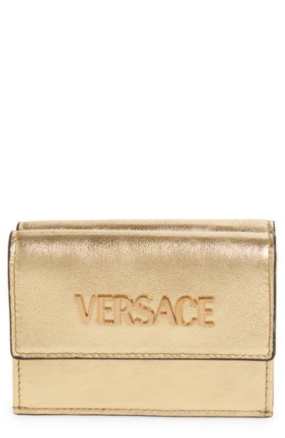 Versace Logo Metallic Leather Trifold Wallet In Gold