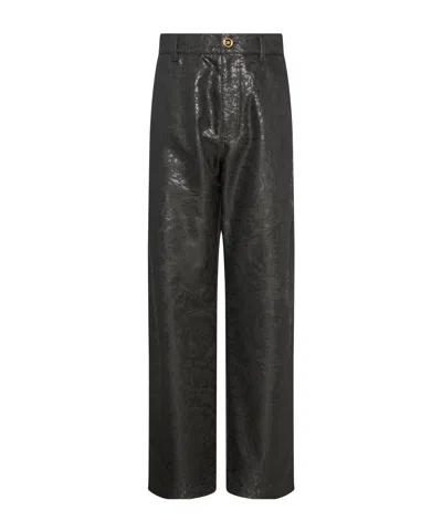 Versace Logo-patch Pattern-jacquard Trousers In Black