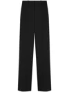 Versace Logo-patch Trousers In Black