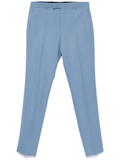 Versace Logo-patch Trousers In Blue