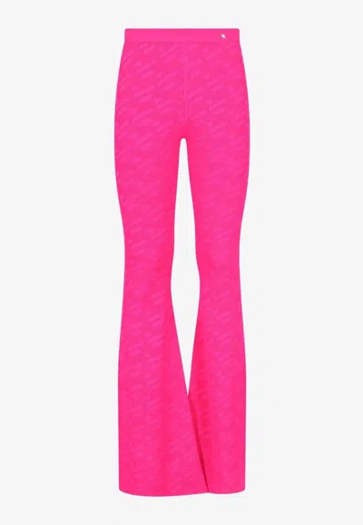 VERSACE LOGO PATTERN FLARED PANTS