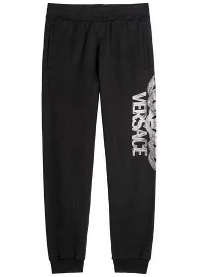 Versace Logo-printed Cotton Sweatpants In Black