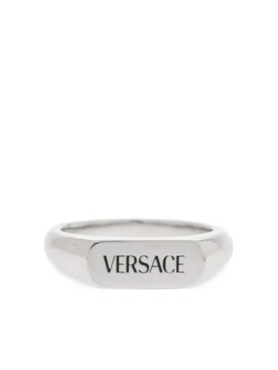 Versace Logo Engraved Ring In Metallic