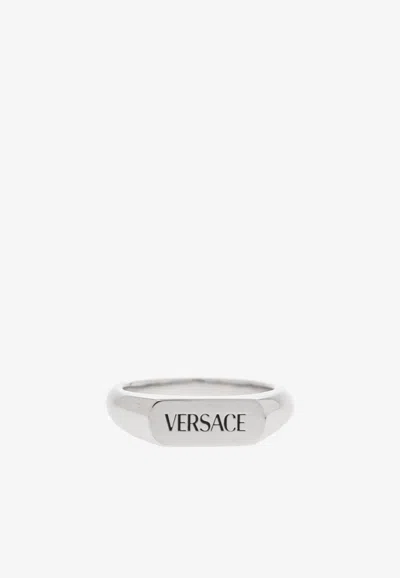 Versace Logo Engraved Ring In Metallic