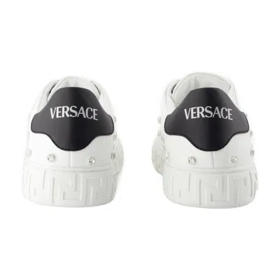 Versace Logo-embellished Calfskin Sneaker In Multi