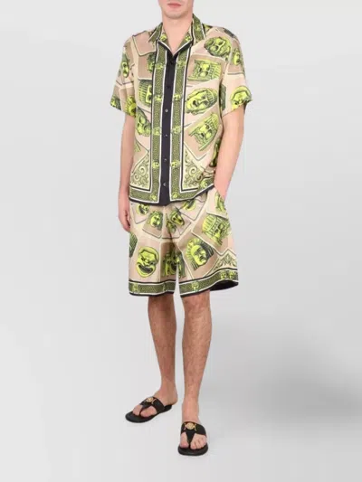 VERSACE MASKS KNEE LENGTH GRAPHIC PRINT SHORTS