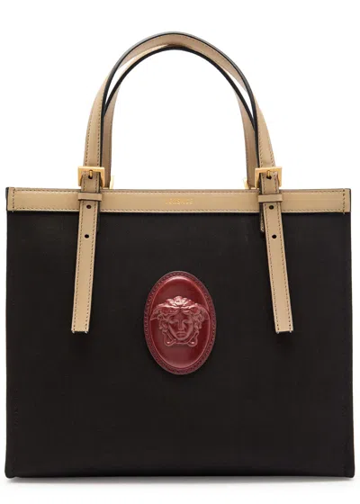 Versace Medium Logo-appliquéd Leather And Canvas Tote In Black