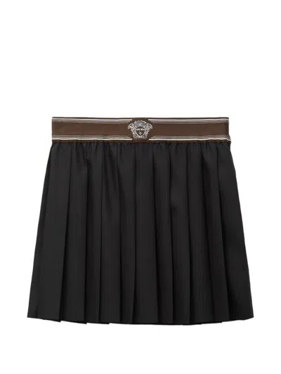 Versace Pleated Mini Skirt With Wide Waistband And Emblem In Black