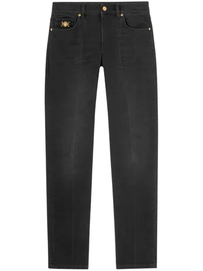 Versace Medusa Head-embellished Mid-rise Slim-fit Jeans In Black